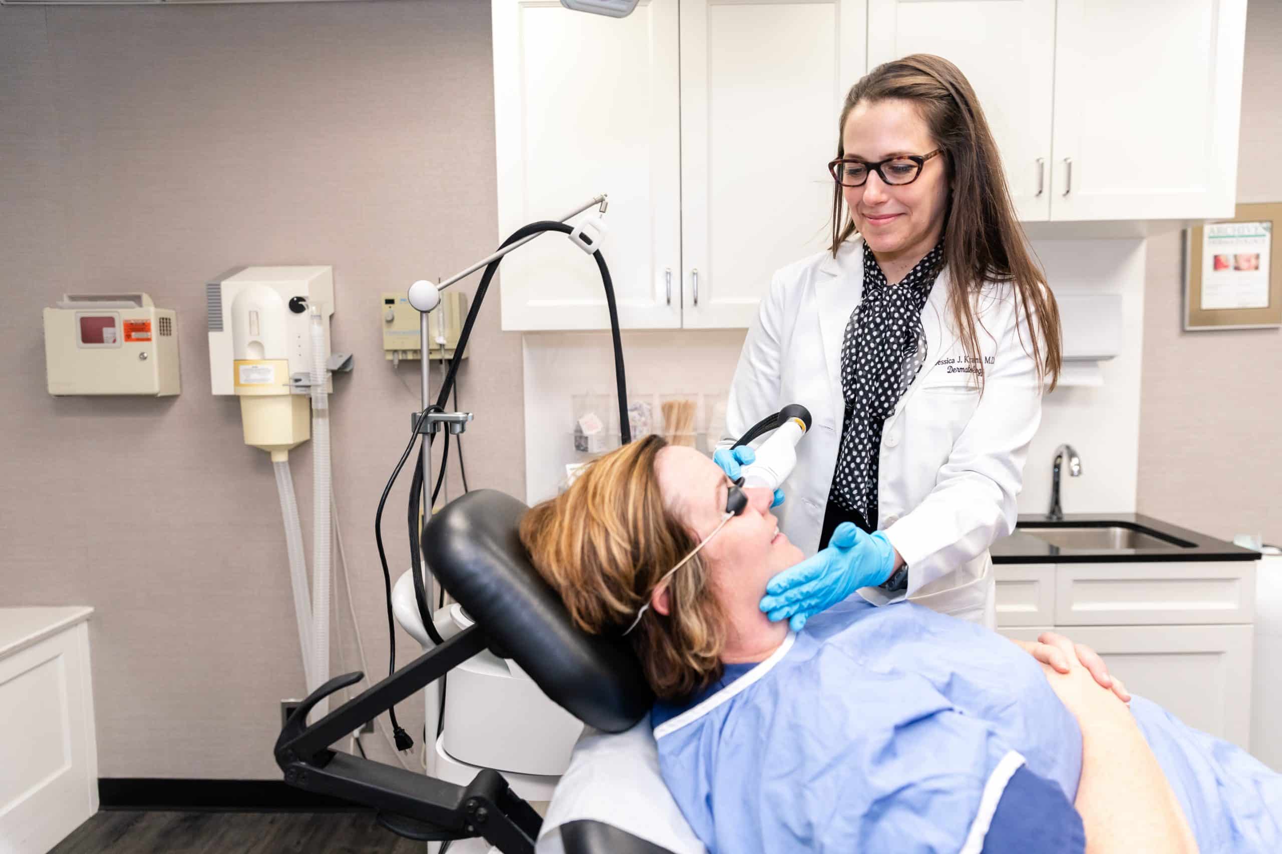doctor providing laser treatment in new york